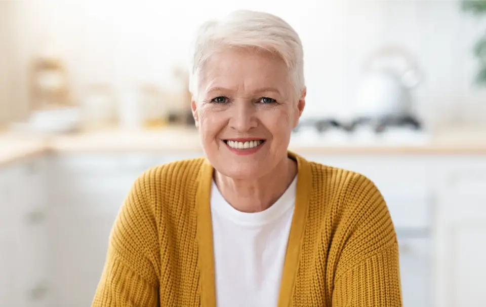 Dental Implants vs Dentures in Calgary: Cost, Comfort & Longevity | SmileNow Blog