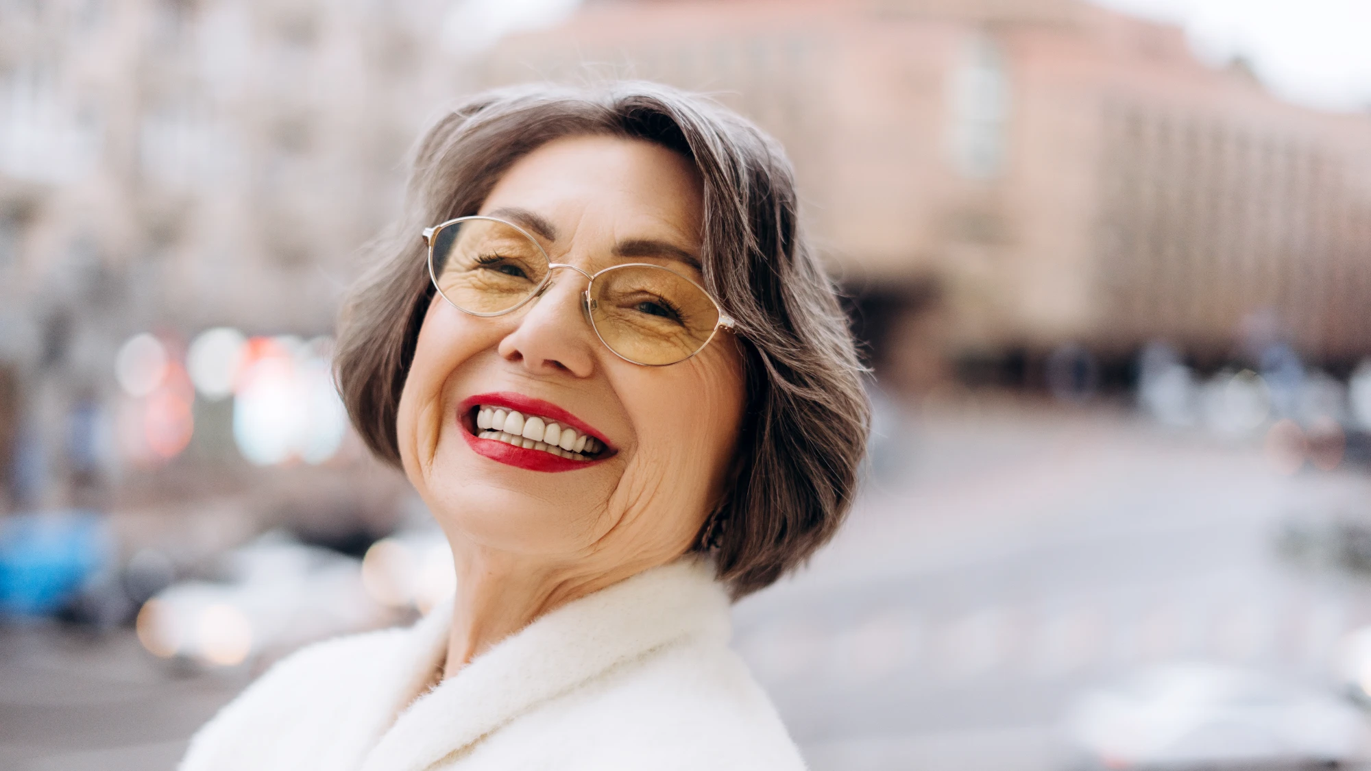 Smiling Calgary dental implant patient showing natural-looking results
